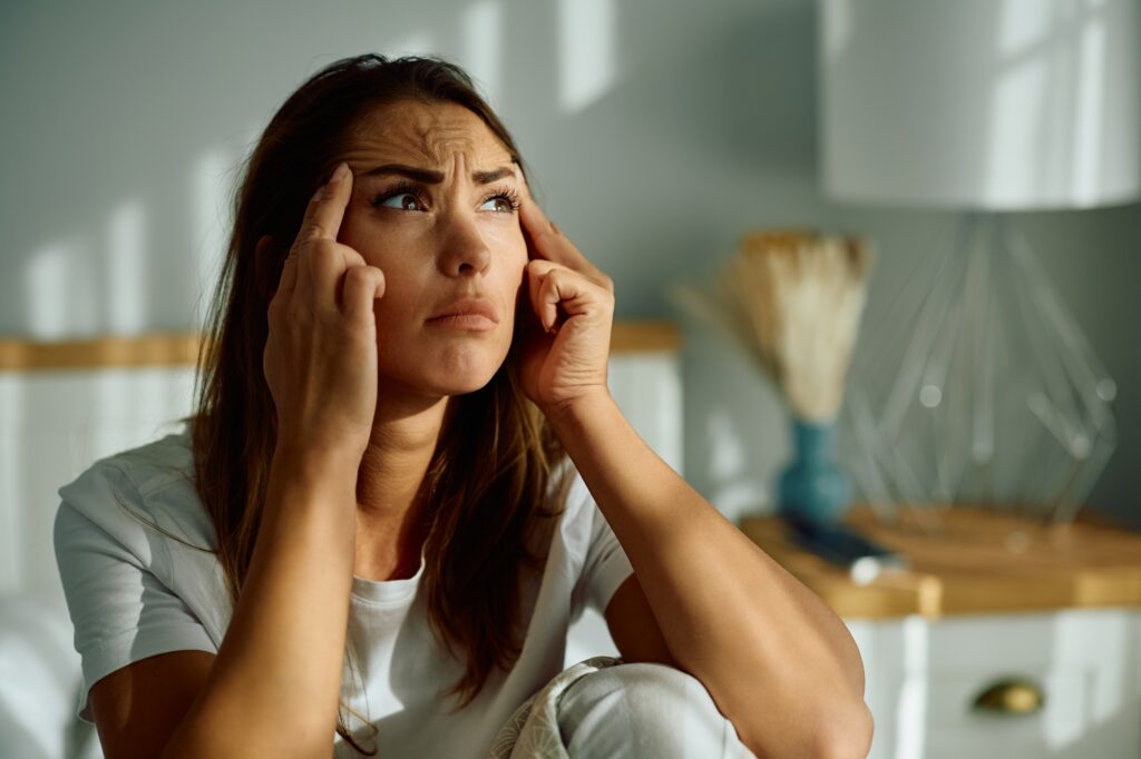 Young woman suffering from morning depression.