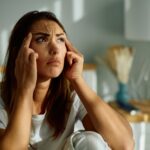 Young woman suffering from morning depression.